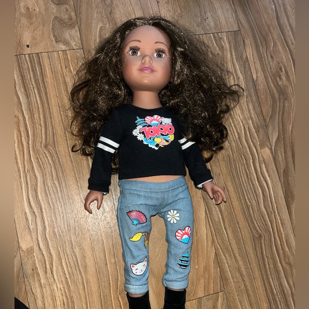 Trendy Graphic Doll with Black Top and Blue Pants